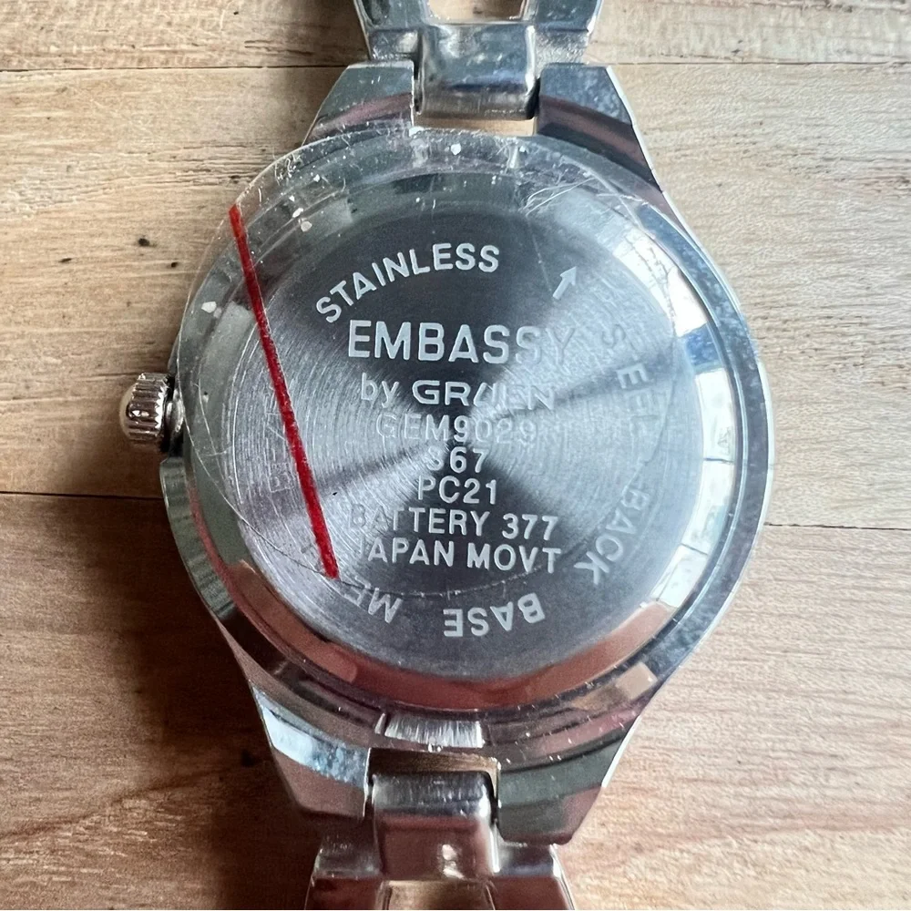 Embassy by Gruen ladies silver tone bracelet watch NEW BATTERY